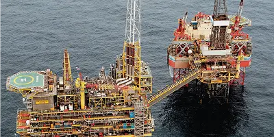 Aerial view of an oil rig platform in the ocean